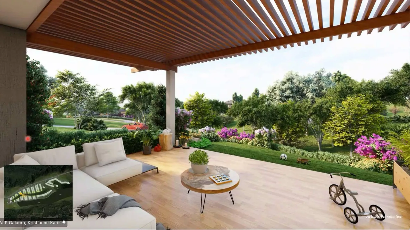 Covered terrace of a premium residence opening onto lush gardens
